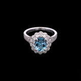18K White Gold Aquamarine And Diamond Halo Ring
