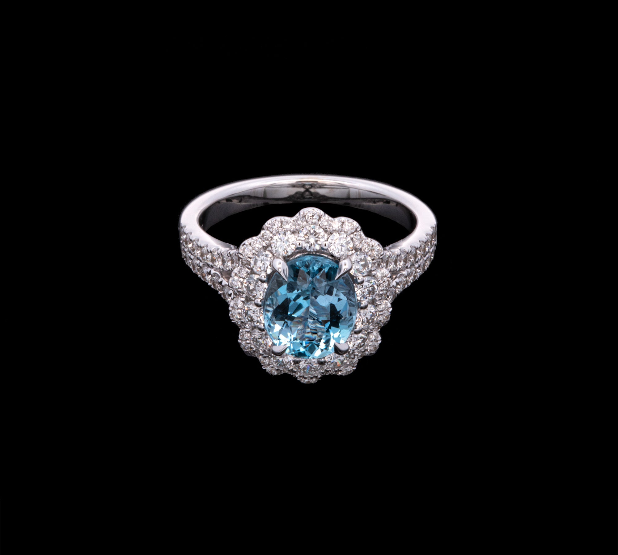 18K White Gold Aquamarine And Diamond Halo Ring