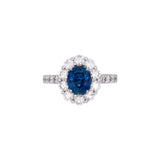 18K White Gold Oval Sapphire And Diamond Halo Ring