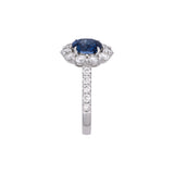 18K White Gold Oval Sapphire And Diamond Halo Ring
