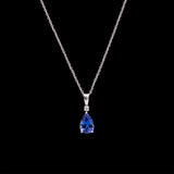 14K White Gold Tanzanite And Diamond Pendant With 18 Inch Chain
