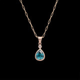 14K Yellow Gold Blue Zircon Bezel Set Pendant And 18K Yellow Gold 1.4mm Oval Link Chain, 18 Inches