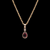 14K Yellow Gold Bezel Set Ruby And Diamond Tear Drop Pendant With 18 Inch Chain