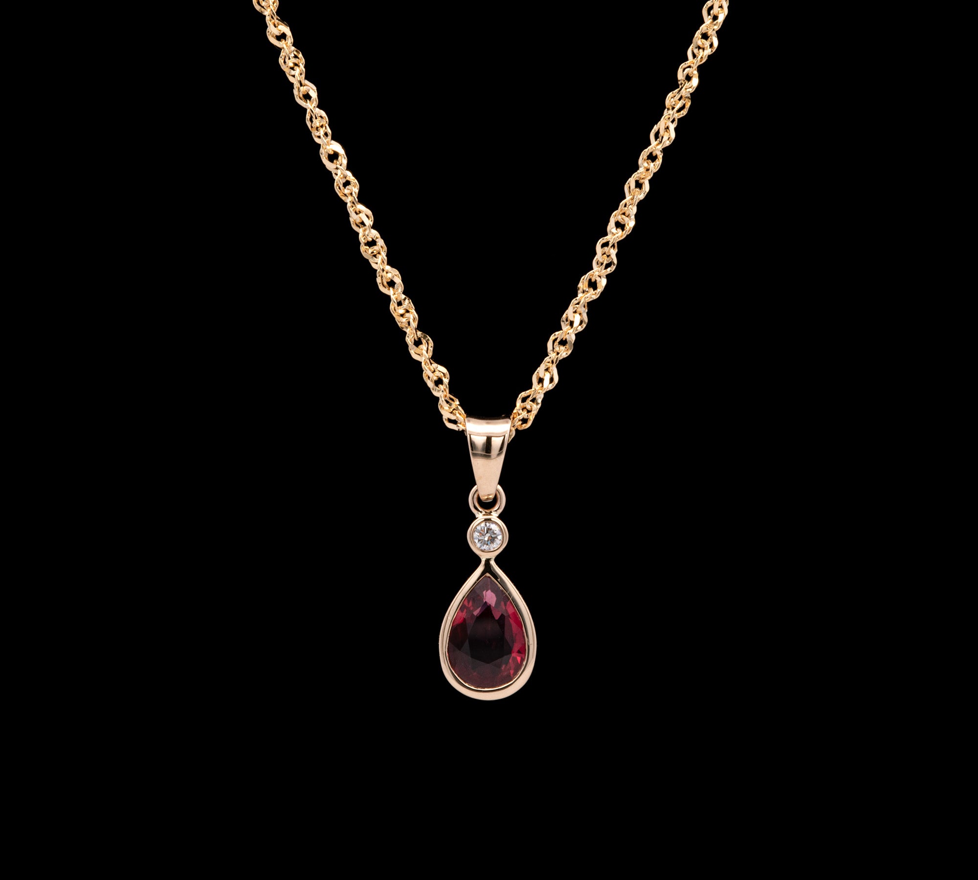 14K Yellow Gold Bezel Set Ruby And Diamond Tear Drop Pendant With 18 Inch Chain