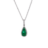 Platinum Emerald And Diamond Halo Pendant With 18 Inch Cable Chain