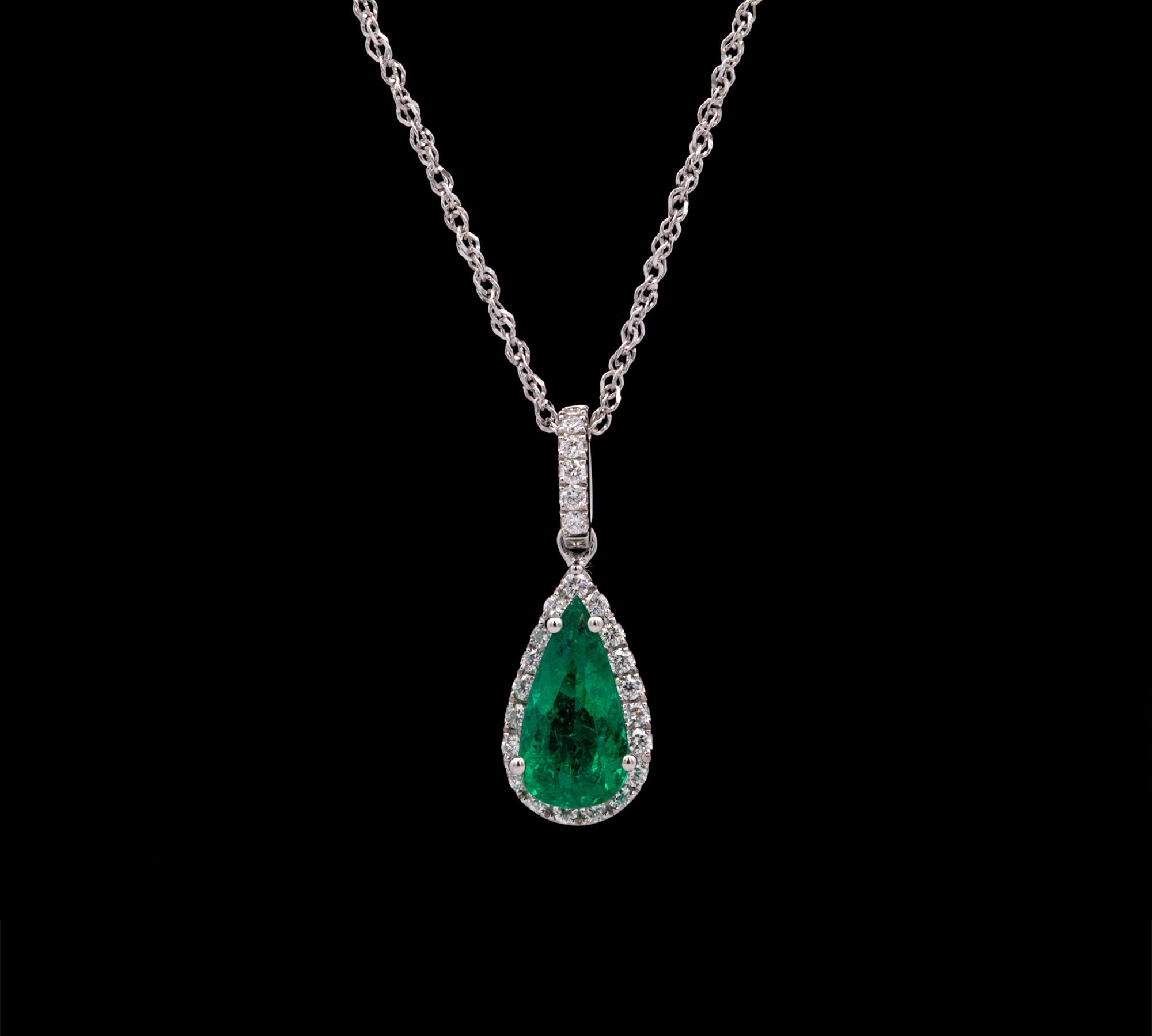 Platinum Emerald And Diamond Halo Pendant With 18 Inch Cable Chain