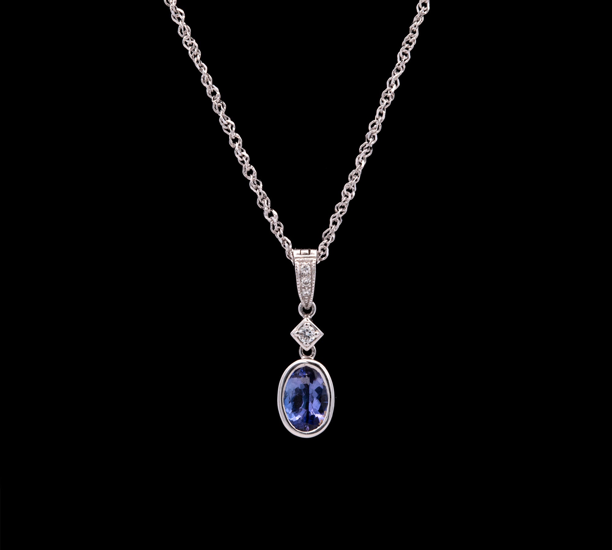 14K White Gold Bezel Set Tanzanite And Diamond Pendant With 18 Inch Cable Chain