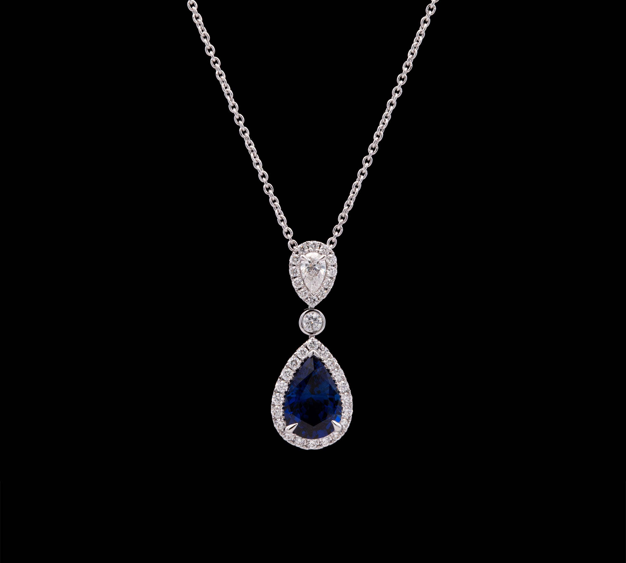 18K White Gold Pear Shaped Sapphire And Diamond Pendant With 16 Inch Chain