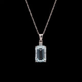 14K White Gold Emerald Cut Aquamarine And Diamond Pendant With 18 Inch Chain