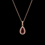 14K Yellow Gold Ruby And Diamond Halo Pendant With 16 Inch Cable Chain