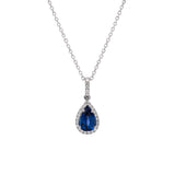 14K White Gold Ceylon Sapphire And Diamond Halo Pendant With 18 Inch Cable Chain.