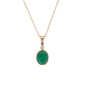 Gold necklace with a green emerald pendant on a white background