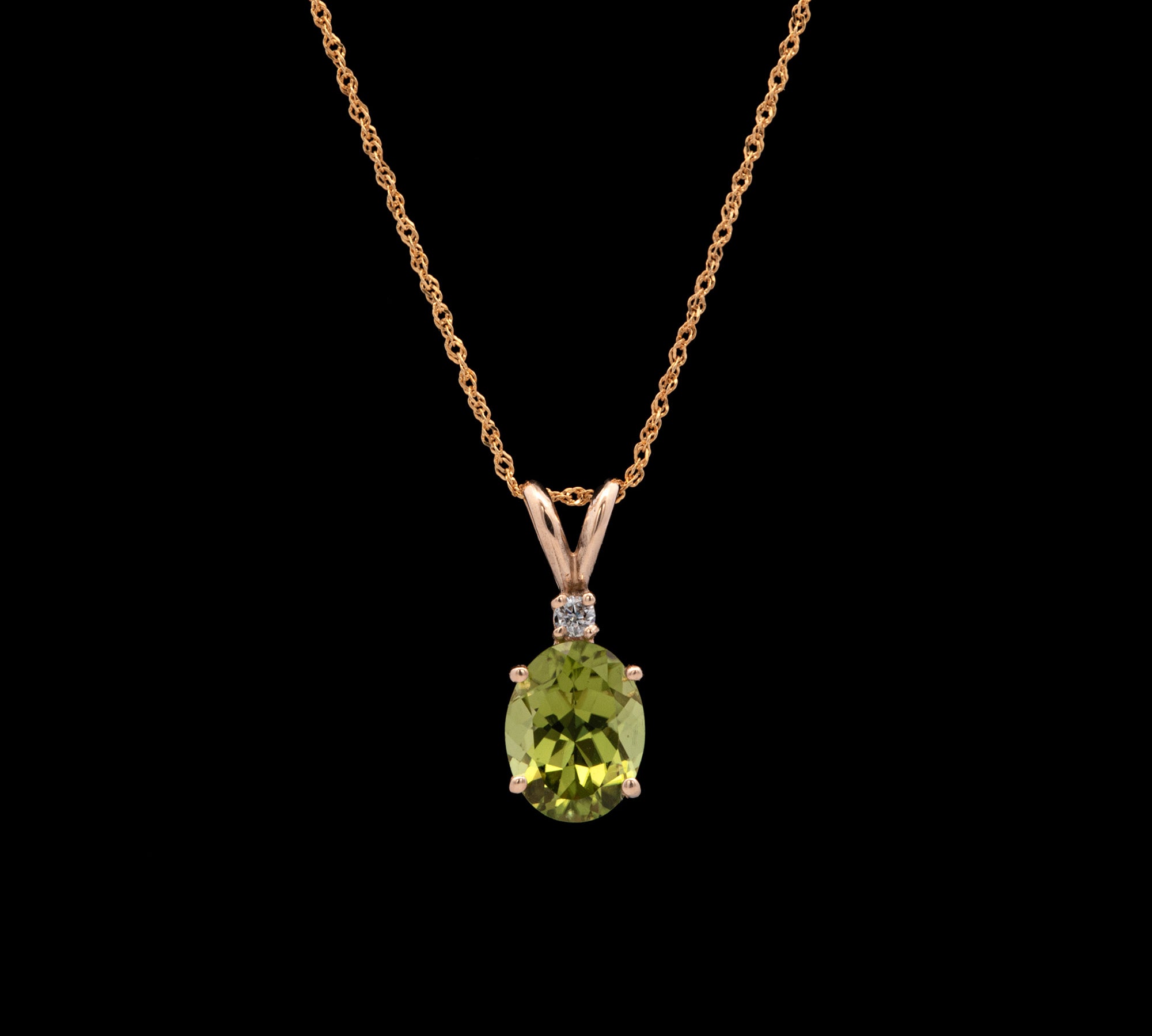 14K Yellow Gold Oval Peridot Pendant With 18 Inch Singapore Sparkle Chain