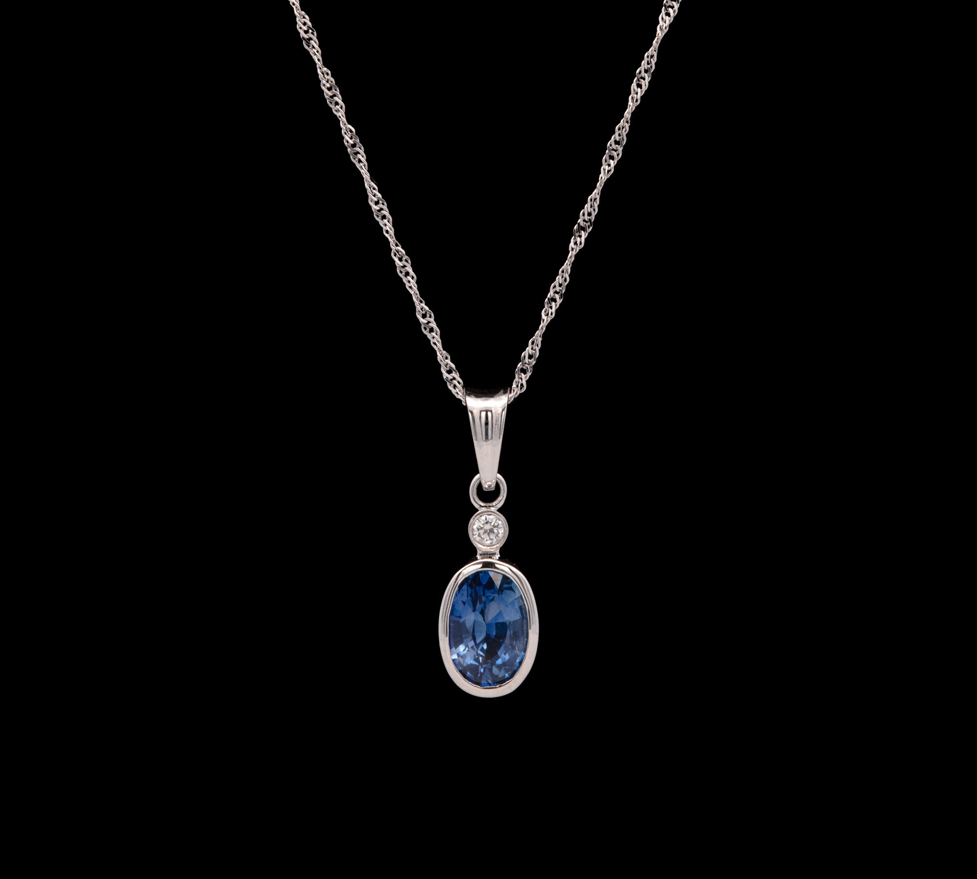 14K White Gold Bezel Set Oval Ceylon Sapphire Pendant With Diamond Accent And 16 Inch Sparkle Chain