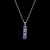 14K White Gold Three Stone Tanzanite Pendant With Diamond Accents And 18 Inch Chain