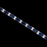 14K White Gold Oval Sapphire And Round Diamond Bracelet, 6.75 Inches