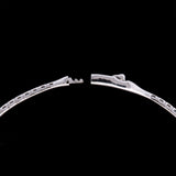 18K White Gold Baguette Sapphire And Diamond Flexible Bangle Bracelet.