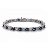 18K White Gold Oval Sapphire And Baguette Diamond Bracelet