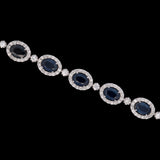 14K White Gold Oval Sapphire And Diamond Halo Bracelet