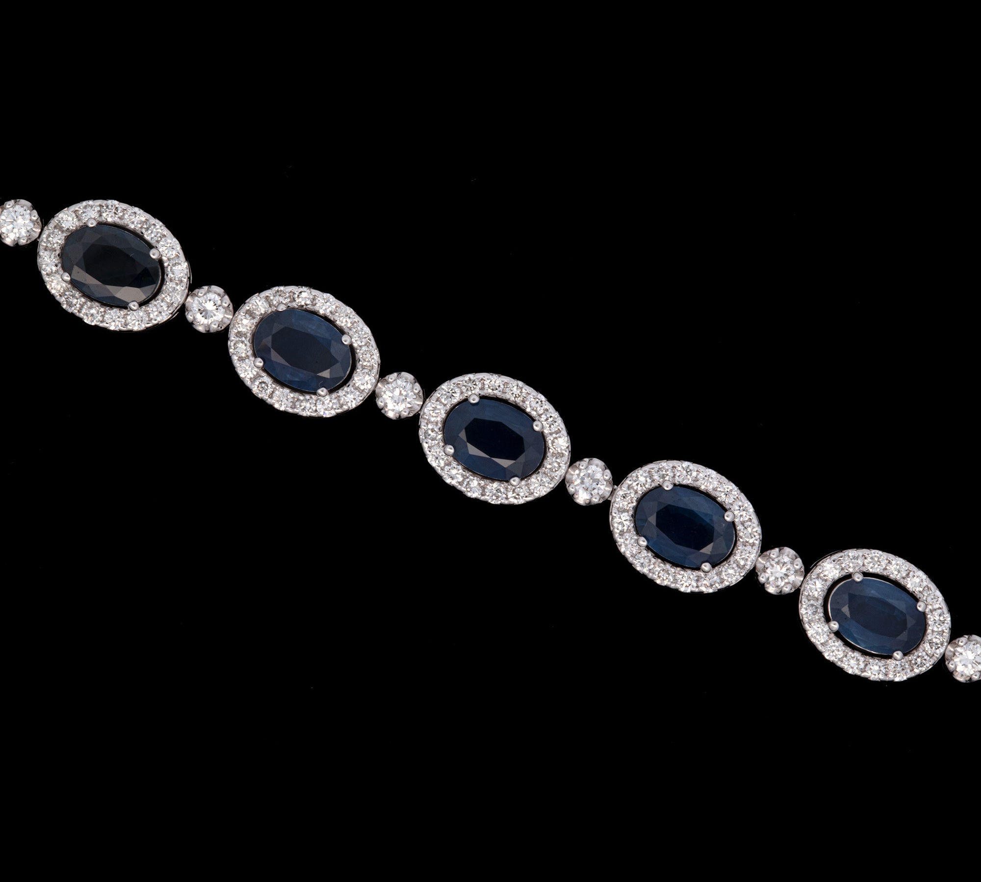 14K White Gold Oval Sapphire And Diamond Halo Bracelet