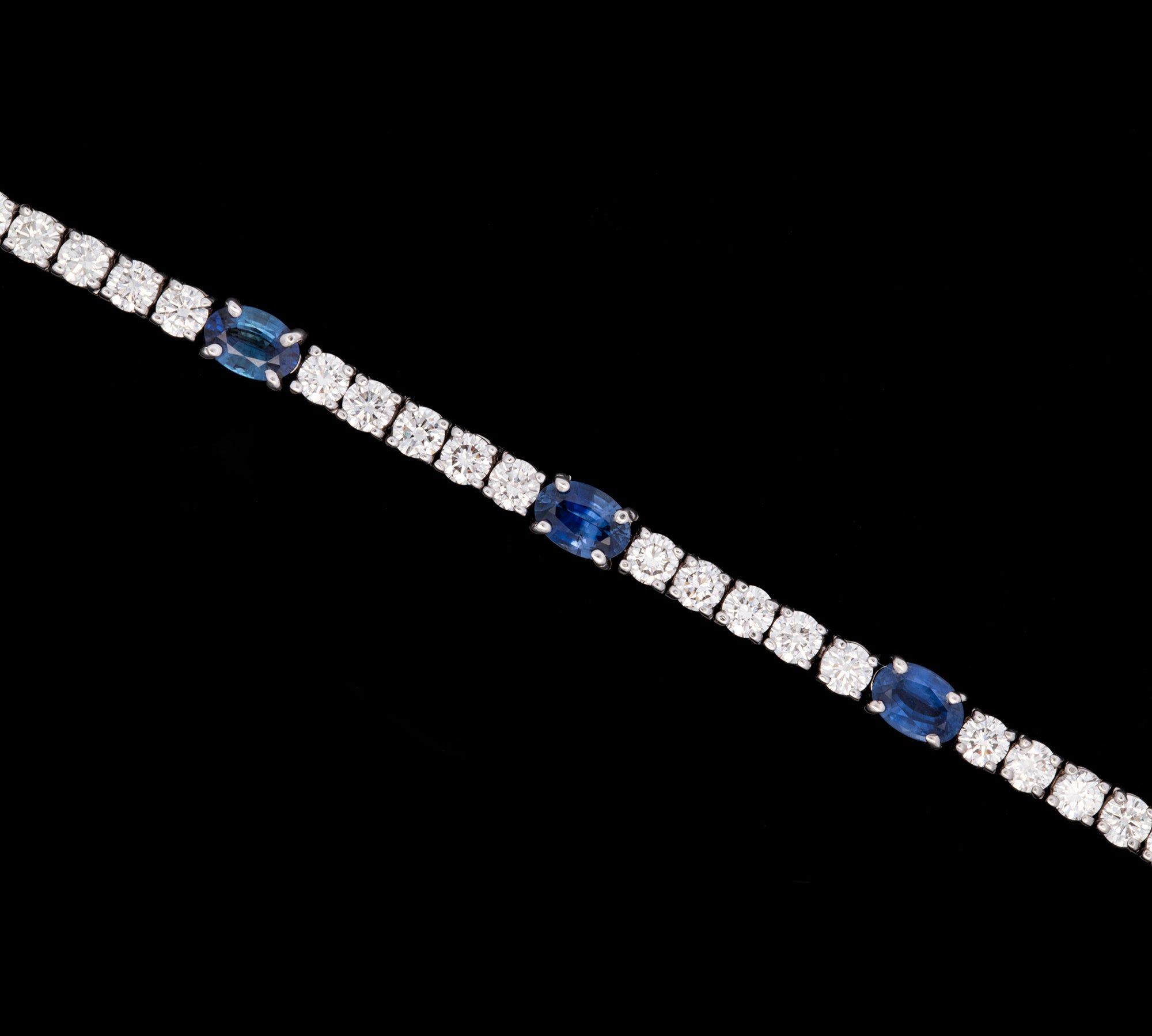 14K White Gold Oval Sapphire And Diamond Bracelet.