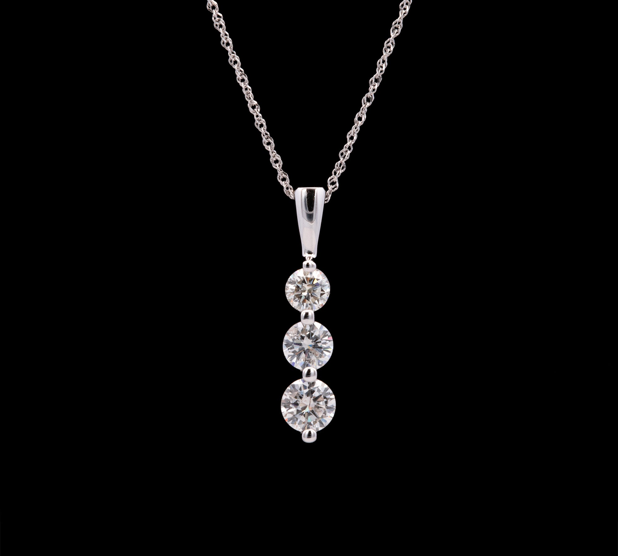 14K White Gold 3 Stone Graduating Diamond Pendant With 18 Inch Chain
