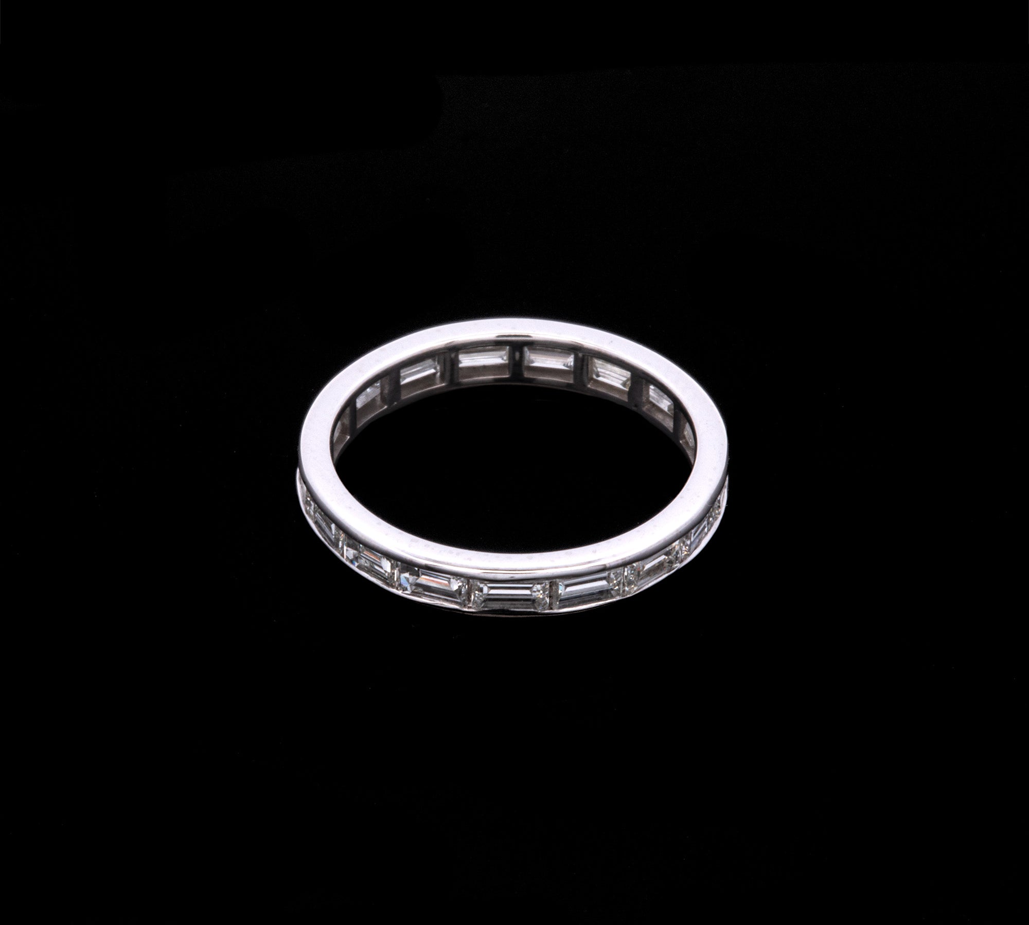 Custom Platinum Channel Set Baguette Diamond Eternity Band