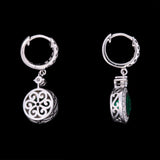Custom 14K White Gold Bezel Set Emerald And Diamond Huggie Style Earrings