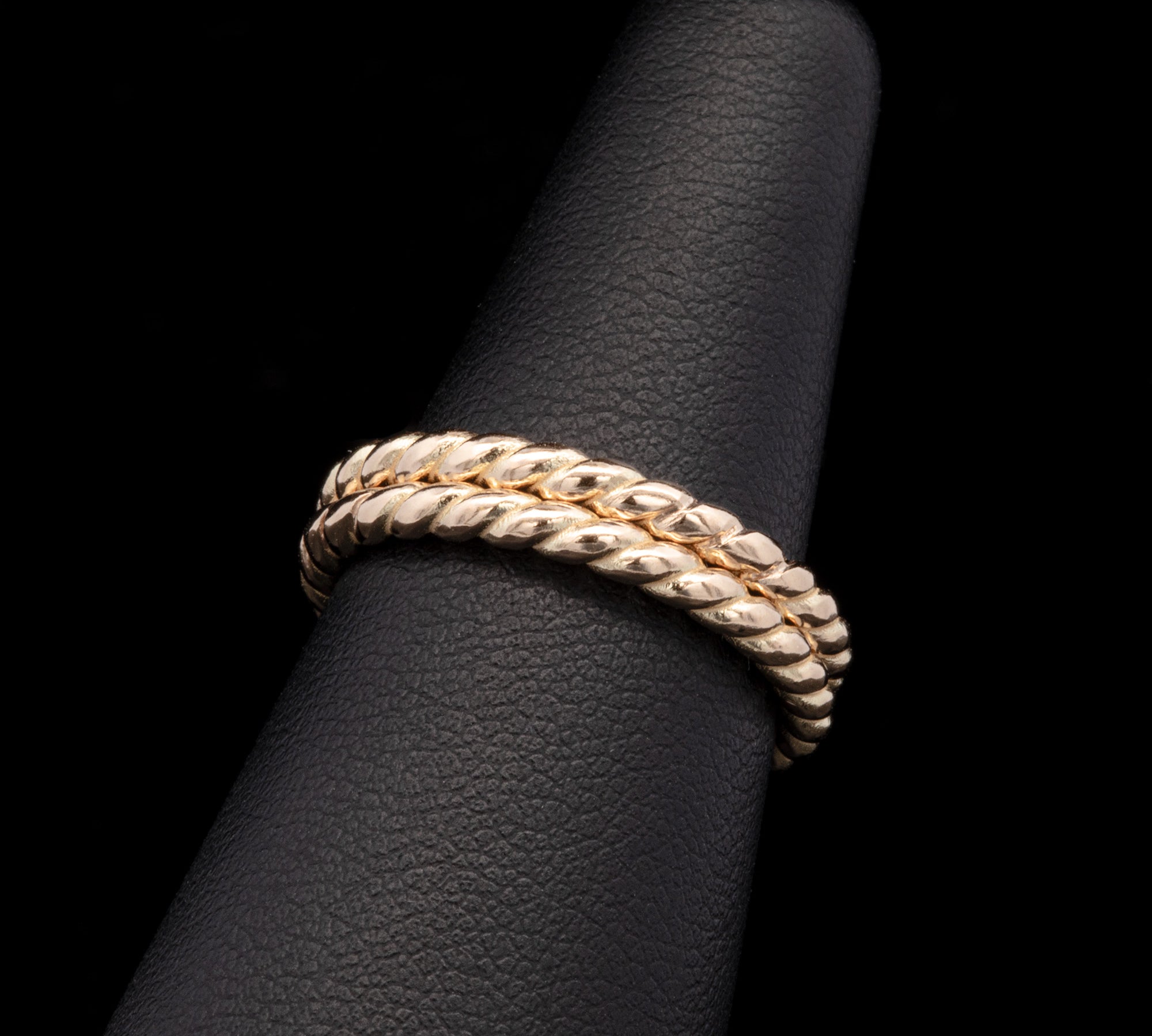 Two Custom 18K Yellow Gold "Twist" Eternity Bands