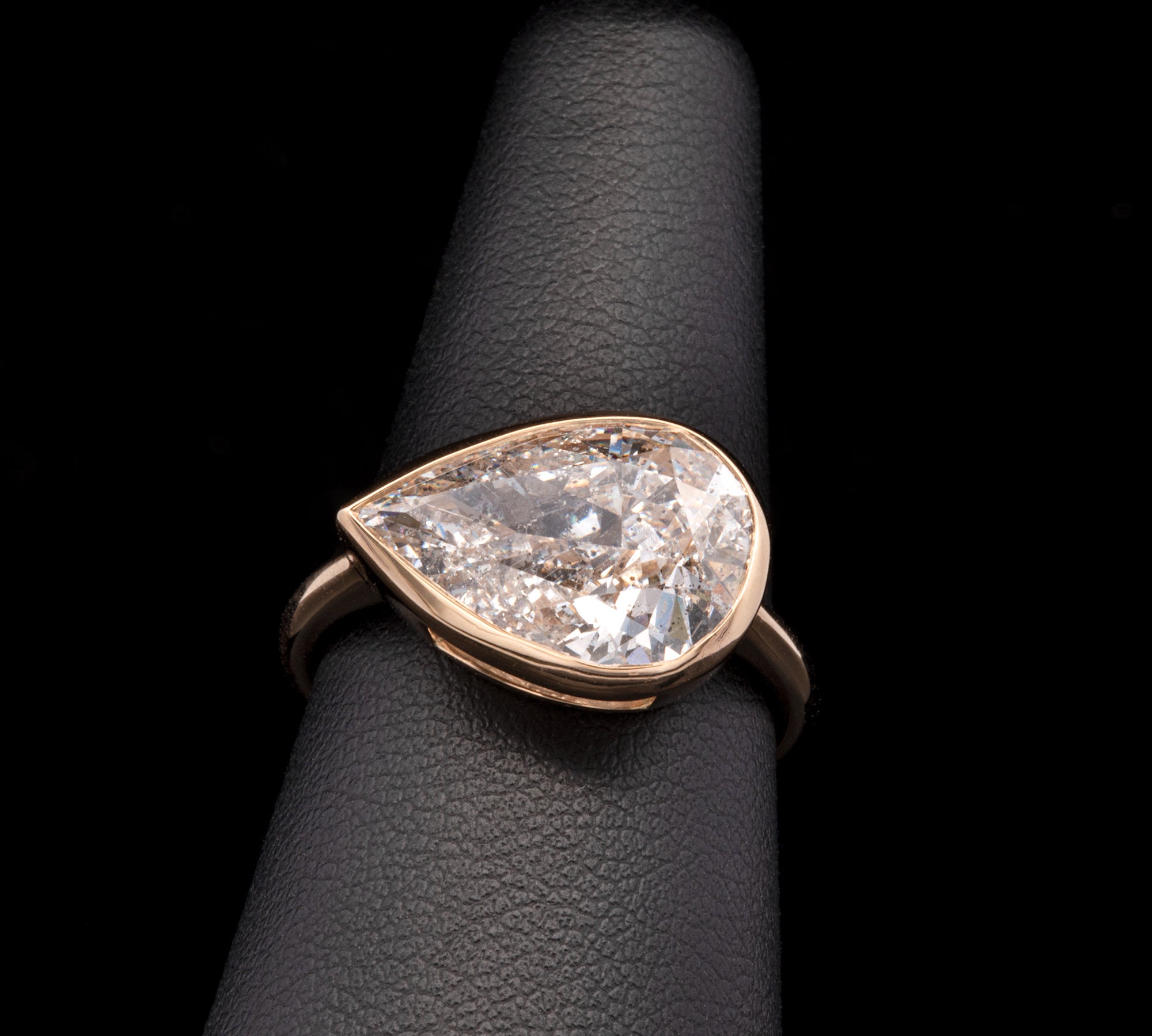 Custom 18K Yellow Gold Bezel Set Pear Shape Diamond Ring.