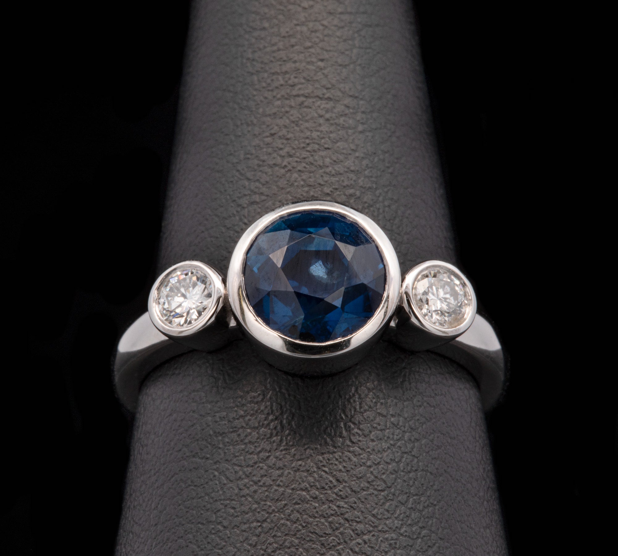 Custom Platinum Bezel Set Sapphire And Diamond Ring