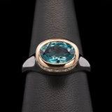 Custom Platinum And 18K Yellow Gold Blue Zircon And Hidden Diamond Halo Ring