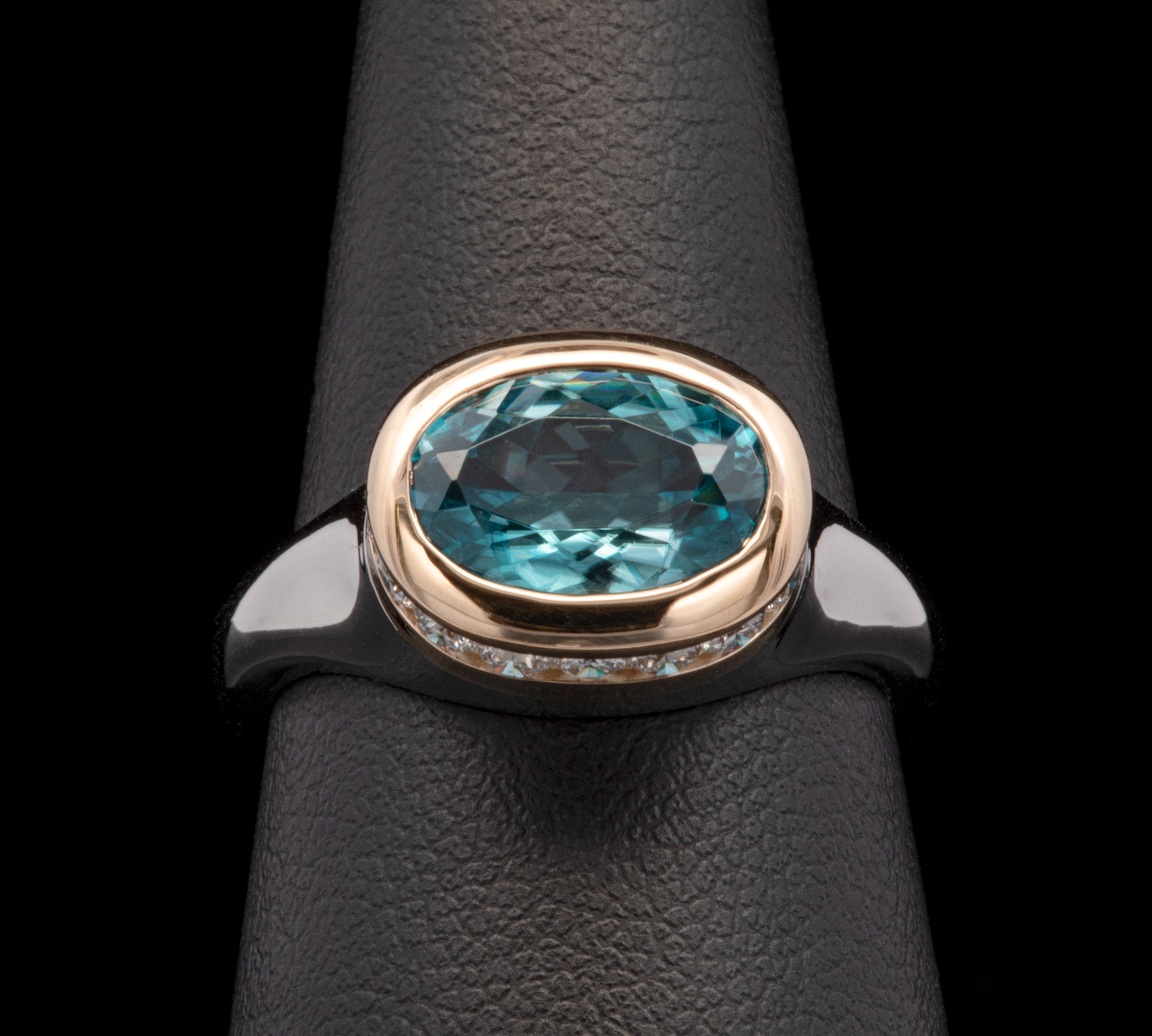 Custom Platinum And 18K Yellow Gold Blue Zircon And Hidden Diamond Halo Ring