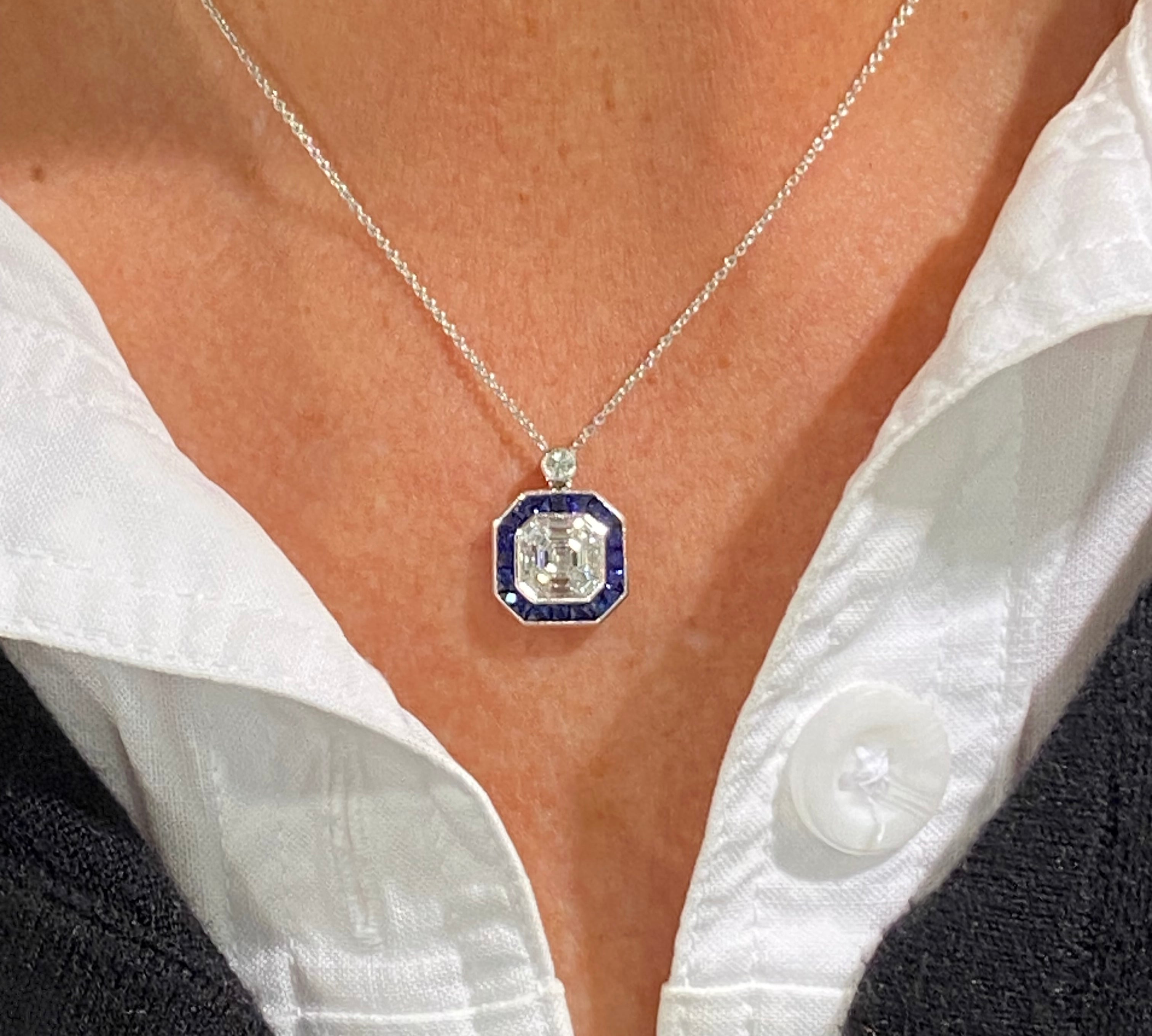 18K White Gold Diamond And Sapphire Halo Pendant With 16 Inch Chain